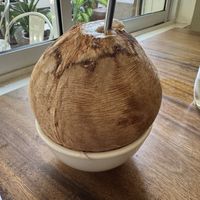 Coconut juice  at Backyard Cafe - Riverside in Phnom Penh