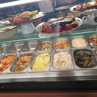 Above the prepared plates, down the cold salad bar at Erbils in Munich