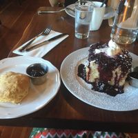 The buiscit with berry preserves and the French Toast. Saturday Brunch menu.  at Harvest at The Bindery in Portland