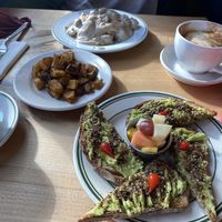 Vegan biscuits and gravy, avocado toast, and potatoes   at Redwing Cafe in Seattle