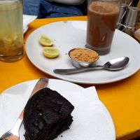 Vegan chocolate cake and indian massala tea with soy milk at Vegan and Raw in Varanasi