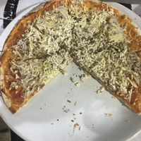 Vegan three cheese pizza  at Vegan and Raw in Varanasi