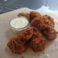 The BEST chicken nuggets I've ever had! And that sauce!! at GYVAS baras in Vilnius