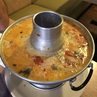 Tom Kha Kai Soup in a bubbling cauldron. at Vegan House in Phoenix