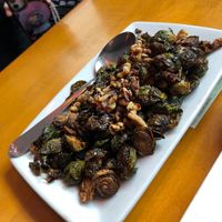 Happy hour Brussel Sprouts no Cheese makes it vegan 🌱   at Sammy's Woodfire Pizza in Las Vegas