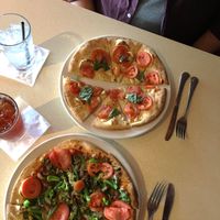 V cheese, spinach, garlic chunks, Roma tomatoes, caramelized onions, broccoli at Brixx Wood Fired Pizza in Franklin