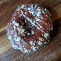 Vegan maple donut with chopped peanut at Awaken Cafe in Oakland