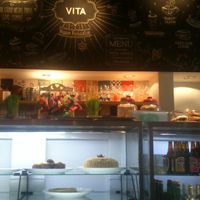 cakes fridge and wall menu at VITA - Palermo in Buenos Aires