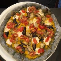 Charcoal base (really good) pizza with home made mozzarella, shiitake mushrooms, artichokes, etc.  Italian with a lovely twist. at FED by Water in East London