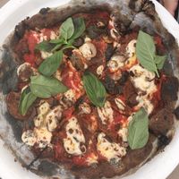 Black pizza boscaiola at FED by Water in East London