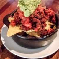 ヴィーガンワカモレナチョス at The Blackstock in Osaka