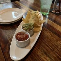 Corn chips and salsa/guacamole appetizer  at The Blackstock in Osaka
