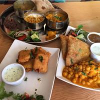 Oops! I already ate some paneer pakora...sorry about the empty space on the plate! at Ranjit's Kitchen in Glasgow