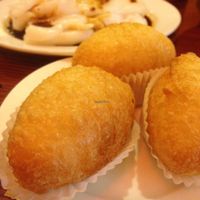 fried sticky rice, shrimp rice rolls in back at Bodhi Kosher Vegetarian Restaurant in New York City