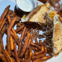 Seitan Texas Cheesesteak with sweet potato fries and vegan ranch   at The Top in Gainesville