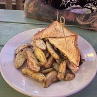 Seitan Philly with herb seasoned potatoes , cooked soft   at The Top in Gainesville