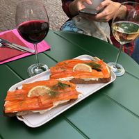 Wine and bread with salmon and cheese  at Alaska Bar in Berlin