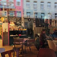 The bar through the windows at Alaska Bar in Berlin