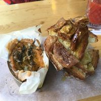 Oven backed cheese with garlic and rosemary &toasted bread, dried figs  at Alaska Bar in Berlin