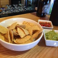 Guacamole, salsa, and chips at One Kombucha in Lake Park