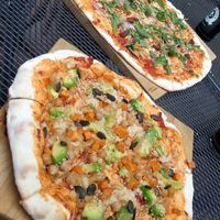 Pizzas in the garden of pizza lab at Pizza LAB in Leipzig