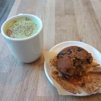 Matcha Mylk and blueberry muffin at Pulp + Sprout Juice Bar and Vegan Cafe in Asheville