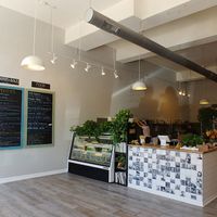 Front, seating to the right at Pulp + Sprout Juice Bar and Vegan Cafe in Asheville