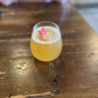 Pineapple turmeric kombucha on tap, garnished with a cute little flower!  at VegeNation in Las Vegas