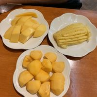 Mango, pineapple, persimmon at Baiyoke Sky Hotel Fruit Buffet in Bangkok