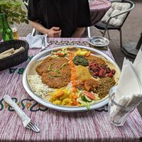 Vegan plate on the right, spicy red lentils on the left at Addis Ababa in Amsterdam
