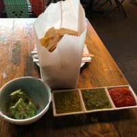 Chips and 3 salsas + guacamole  at Hola Arepa in Minneapolis