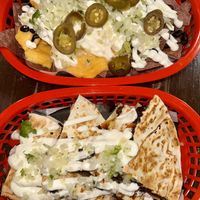 Seitan asada quesadilla & guacamole nachos   at Momencik in Warsaw