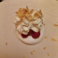 Vegan meringue, raspberry sorbet, fresh raspberry a & pineapple, and soy whipped cream at Konnubio in Florence
