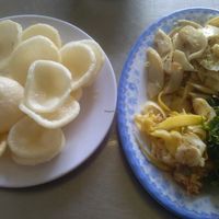 Fried mushroom with lemon grass and vegan prawn crackers. at An Nhu in Hoi An