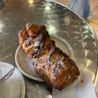 Brioche di pasta sfoglia e cannella ricoperta con cioccolato   at Fratelli Piermattei in Rome