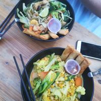Two different bowls with added springrolls at King CookDaily in East London