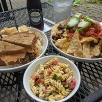 Reuben with extra sauce, nachos with sour cream, and pasta salad. 💥👌 at The Lunch Room Bakery & Cafe in Ann Arbor