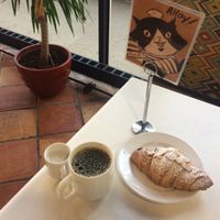 Almond croissant & coffee  at The Lunch Room Bakery & Cafe in Ann Arbor
