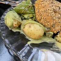 Burger 😏 potatoes with green sauce were delicious though! at La Camelia Vegan Bar in Bilbao