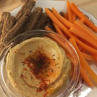 Hummus, bread and carrots at La Camelia Vegan Bar in Bilbao