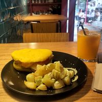 Pita with smoked Tofu, Patatos and Orange Juice at La Camelia Vegan Bar in Bilbao