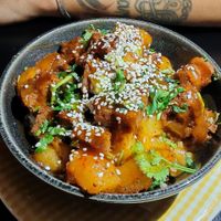 Poke bowl with seitan and pineapple at La Camelia Vegan Bar in Bilbao