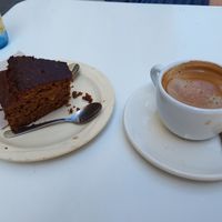 Cake with coffee at La Camelia Vegan Bar in Bilbao