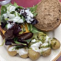 “La nueva” Burguer with extra potatoes at La Camelia Vegan Bar in Bilbao