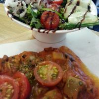 Vegan pizza and side salad at Sugo Pizza Al Taglio - Aert van Nesstraat in Rotterdam