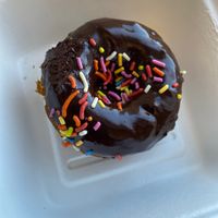 chocolate glazed donuts ❤️💜❤️  at Harmony Bakery in Baltimore