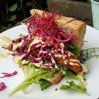 Sandwich with vegan sausage at FOAM in The Hague