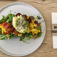 Scrambled tofu sandwich with avocado and tempeh bacon at FOAM in The Hague