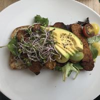 Toast with tempeh "bacon" and avocado at FOAM in The Hague