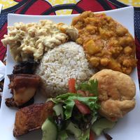 Small plate - mac & cheese, chickpea curry, brown rice, spelt dumpling, roasted potatoes and AMAZING mushrooms 😋  at LoveGift Vegan Cafe in South East London